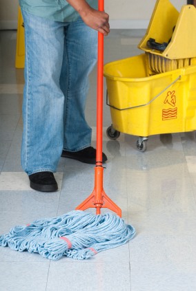 Danit Cleaning Services Inc. janitor mopping floor